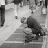 Christoph Radke, New York City, man fishing for coins, 2005